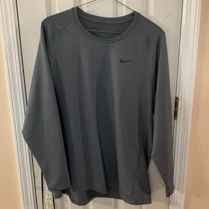 Grey Nike long sleeved insulated shirt.